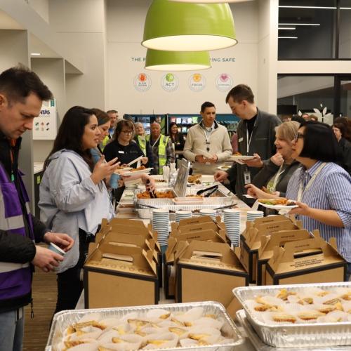 A group of Second Harvest Heartland employees gather for lunch