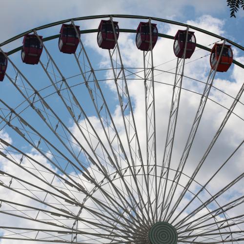 A closeup photo of a ferris wheel