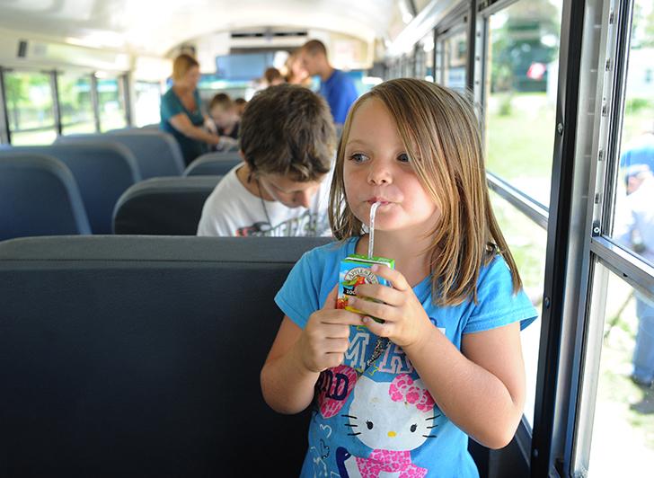 Girl on School Bus