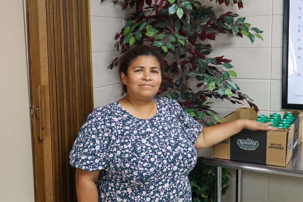 A woman in a food shelf