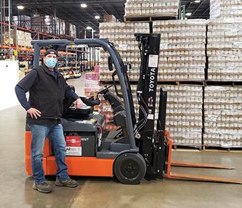 Derek Next to Forklift