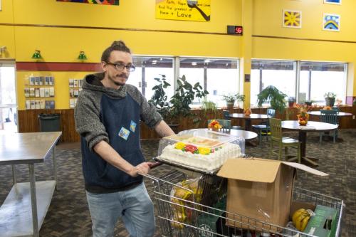 Nathan shopping at the Catholic Charities Food Shelf