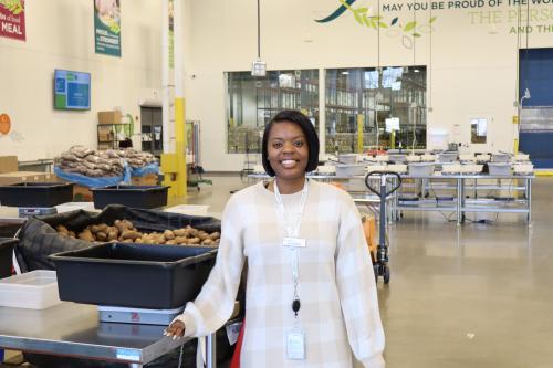 A person posing in a volunteer center