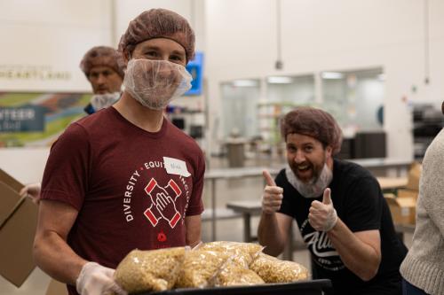 Volunteers pack at our Volunteer Center