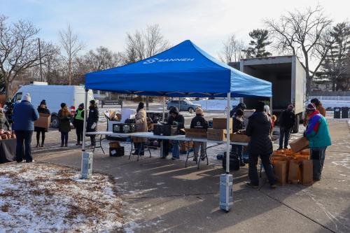 A popup tent for Sanneh Foundation distributing hams